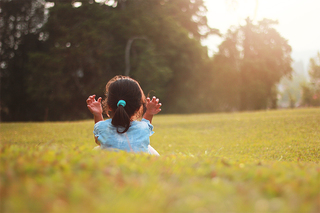 child outside sun